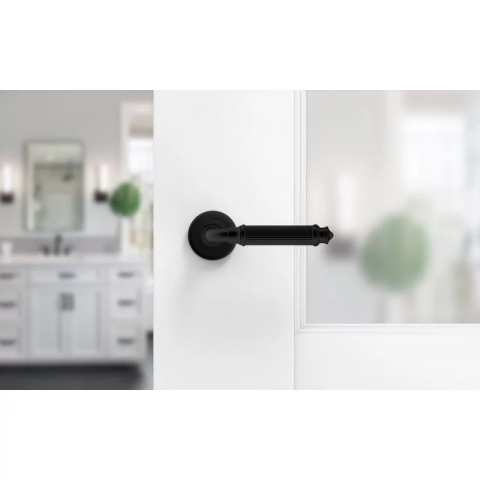 Klamka Aria R CL czarna na rozecie okrągłej Corona