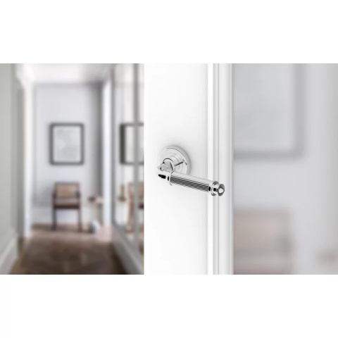 Klamka Aria R CL chrom błyszczący na rozecie okrągłej Corona