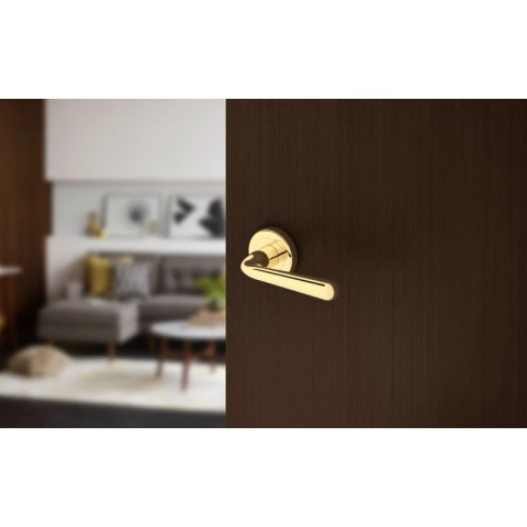 Klamka Handy R CL mosiądz błyszczący PVD na rozecie okrągłej Corona