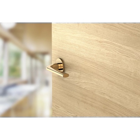 Klamka Scandi Slim mosiądz błyszczący PVD na rozecie okrągłej Corona