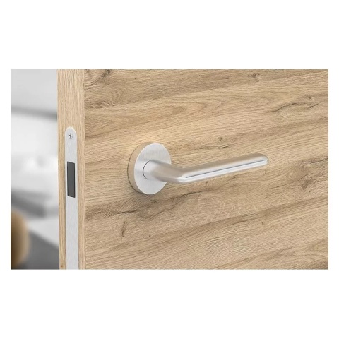 Klamka Spark chrom szczotkowany na rozecie okrągłej Corona